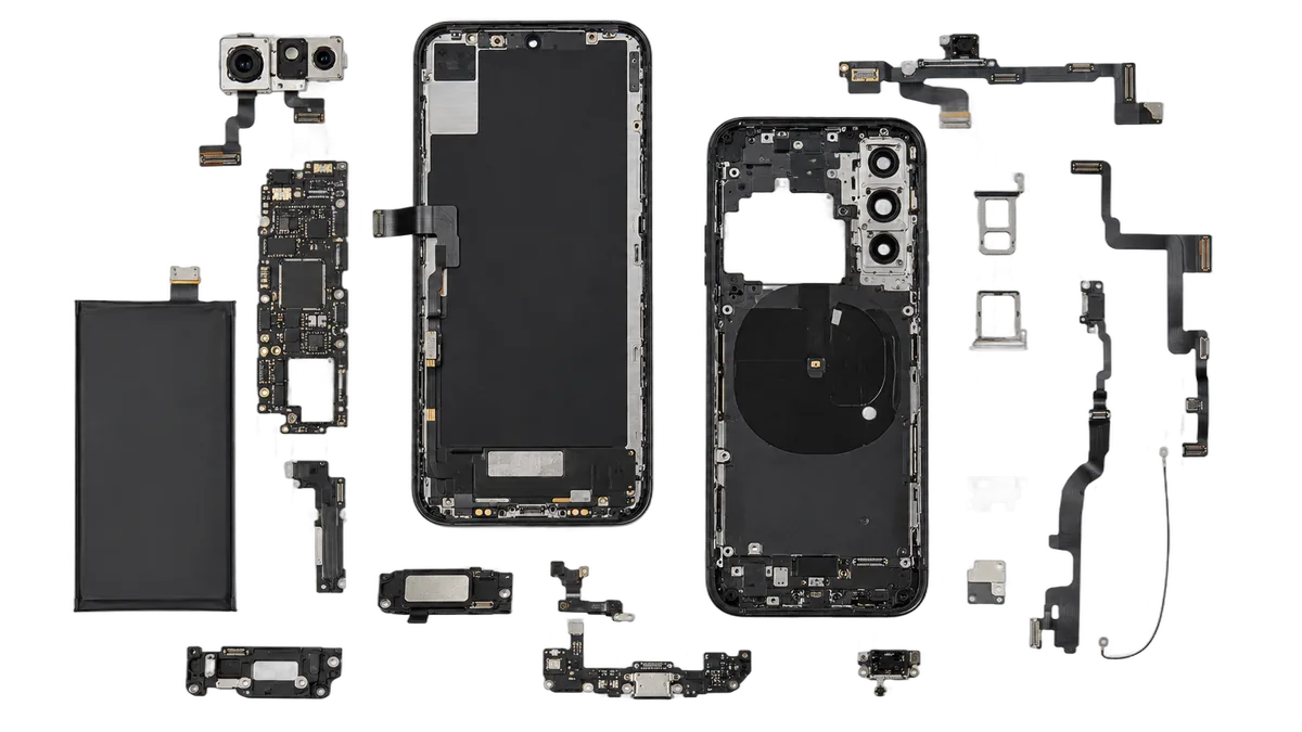Disassembled smartphone with all components laid out